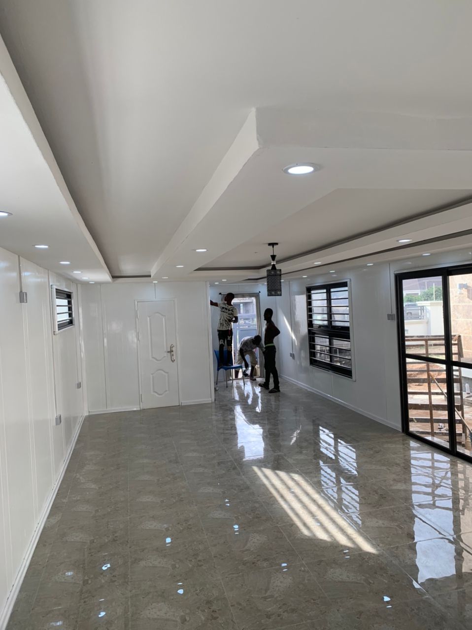Executive Office Fit-Out — White-finished interior with coffered ceiling
