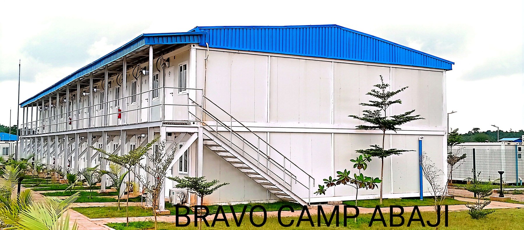 Bravo Camp, Abaji — Corner elevation with external staircase
