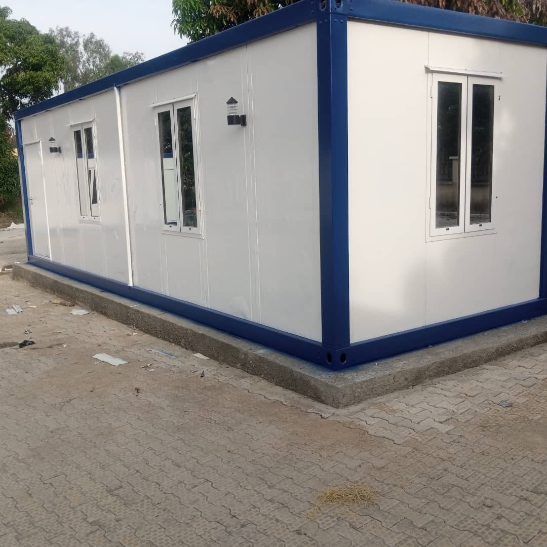 Field Deliveries & Site Installations — White & blue twin-module site office