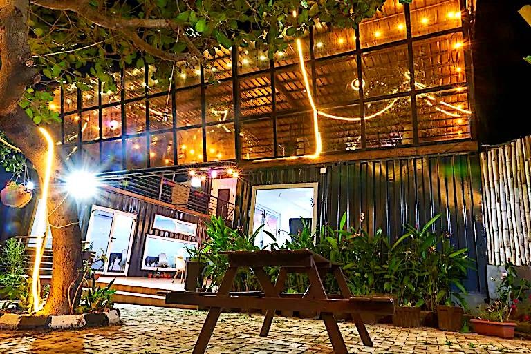 L & Z Restaurant — Bamboo-clad facade in the evening