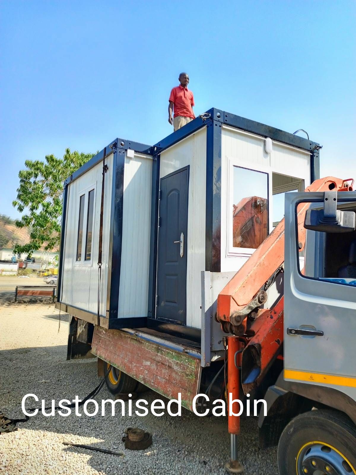 Customised prefab cabin loaded for delivery