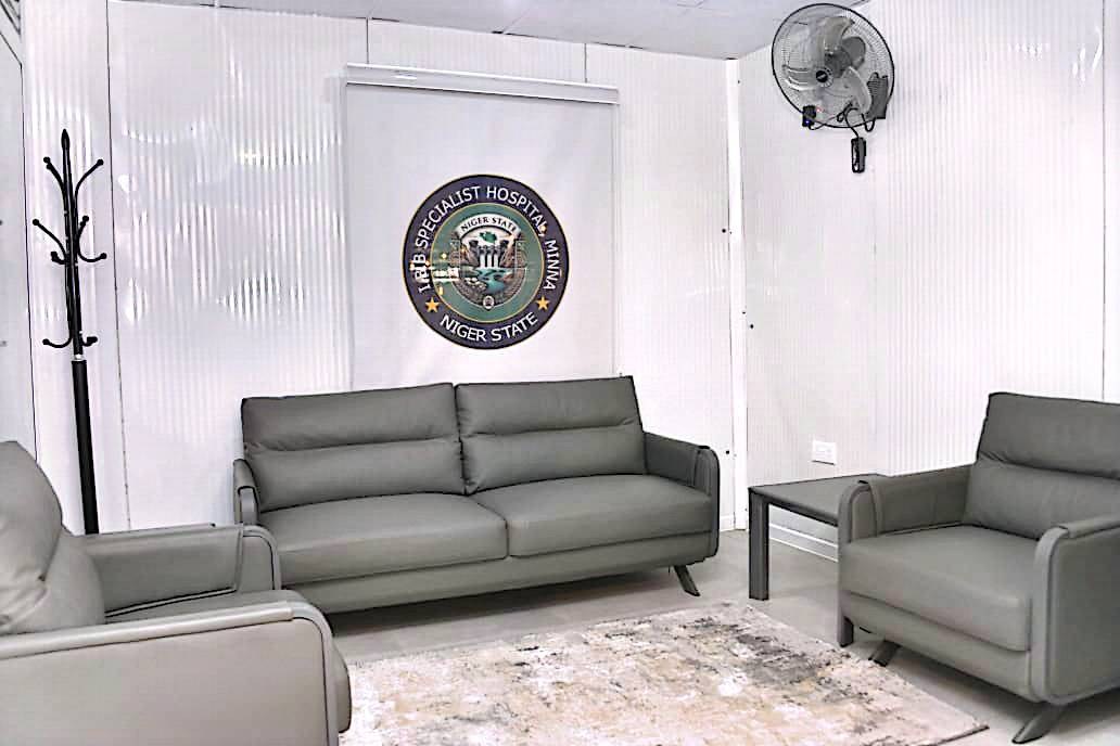 IBB Specialist Hospital — Patient lounge with branded crest