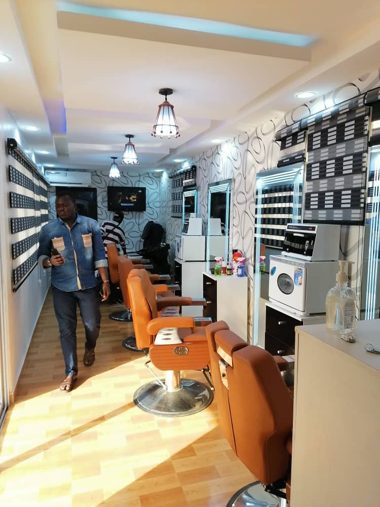 Container Barber & Salon Fit-Out — Barber salon interior with mirrored stations