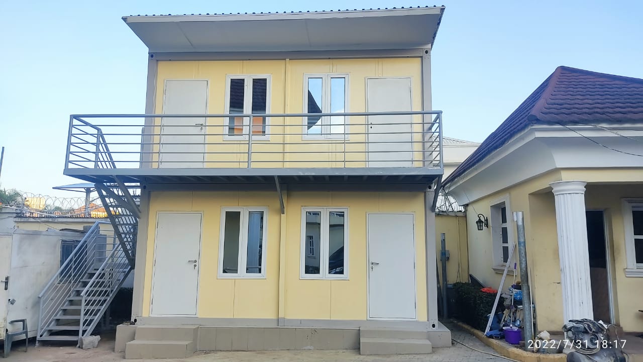 Two-Storey Staff Quarters — Front elevation with balcony and external stair
